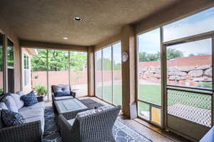 Sunroom with outdoor lounge area
