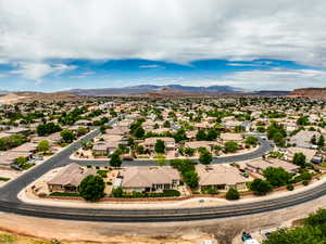 Drone / aerial view with a mountain view and a residential view