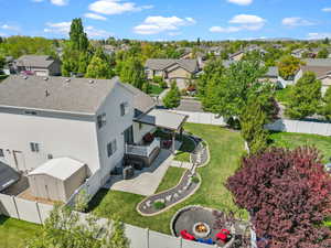 Birds eye view of property with a residential view