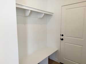 Mudroom featuring dark wood-type flooring