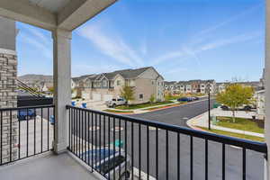 Balcony featuring a residential view