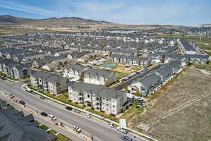 Aerial view featuring a mountain view and a residential view