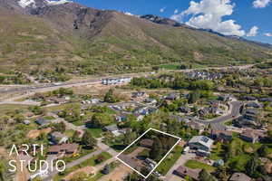 Birds eye view of property featuring a residential view and a mountain view