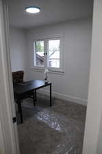 Bedroom number two. Featuring new carpet.