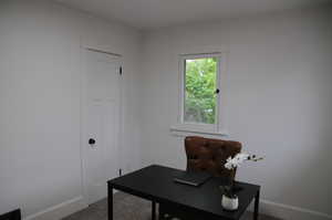 Bedroom number two. Featuring new carpet.