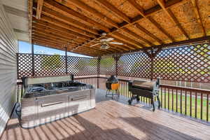 Hot tub/grilling area has lattice for privacy
