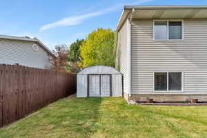 Storage shed in side yard