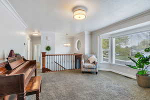 Living room has huge bay window