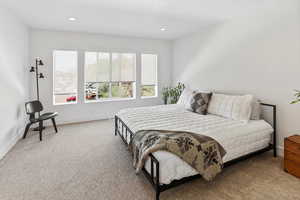 Bedroom featuring carpet floors, recessed lighting, and baseboards
