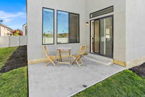 View of patio with fence