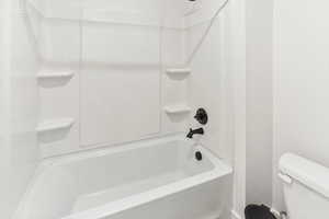 Bathroom with walk in shower and toilet