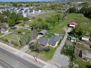Birds eye view of property with a residential view
