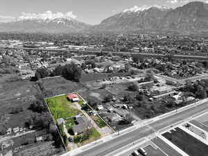 Birds eye view of property with a mountain view