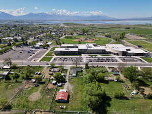 Drone / aerial view with a water and mountain view