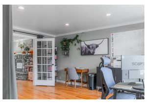 Office area featuring recessed lighting, ornamental molding, and wood finished floors