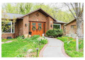 View of front of property with brick siding