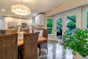 Dining space featuring recessed lighting