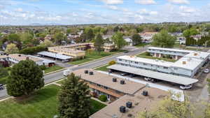 Birds eye view of property featuring a mountain view and a residential view