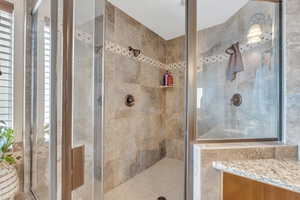 Large walk-in shower with custom tilework