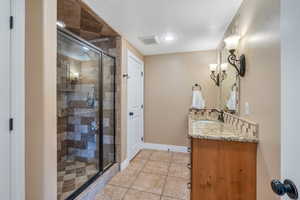 Basement bath has beautiful walk-in shower