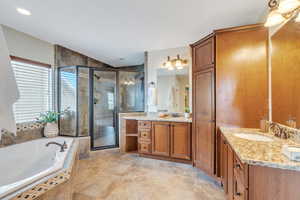 Luxurious master bath with double vanities and jetted tub