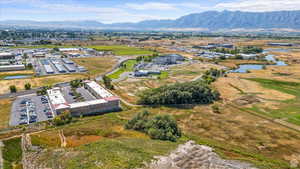 Bird's eye view with a water and mountain view