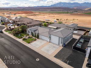 Birds eye view of property featuring a mountain view and a residential view