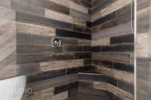 Primary Full bathroom with tiled to the ceiling shower