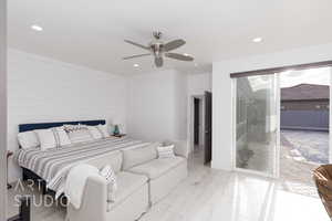 Primary Bedroom featuring recessed lighting, ceiling fan, and access to outside