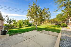 View of patio / terrace with a fenced backyard and a trampoline