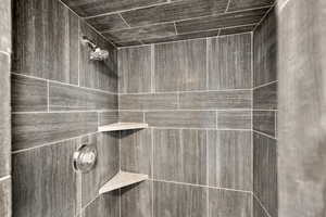 Details with a tile shower