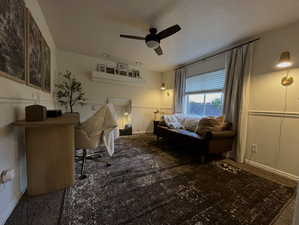 Bedroom featuring baseboards and ceiling fan