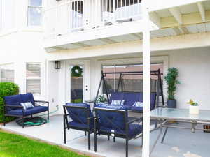 View of patio / terrace featuring an outdoor hangout area and a balcony