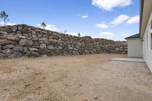 View of yard rock wall