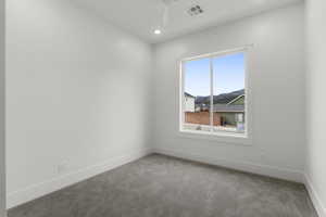 Carpeted empty room with recessed lighting, baseboards, and ceiling fan