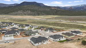 Aerial view featuring a mountain view and a residential view