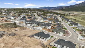 Drone / aerial view featuring a residential view and a mountain view