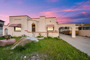 Mediterranean / spanish-style house with stucco siding