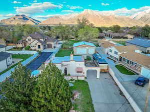 Birds eye view of property featuring a residential view and a mountain view