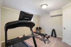 Workout room or additional bedroom with a window and closet