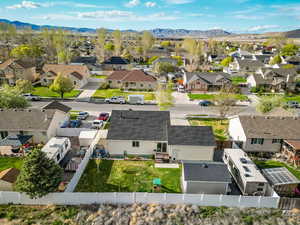 Birds eye view of property with a mountain view and a residential view. AND The BRAND NEW ROOF :)