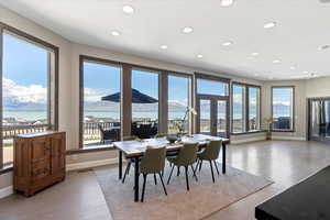 Dining space with recessed lighting, visible vents, plenty of natural light, and light wood-style floors