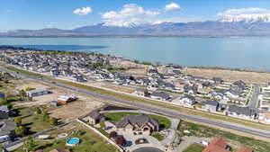 Aerial view with a water and mountain view and a residential view