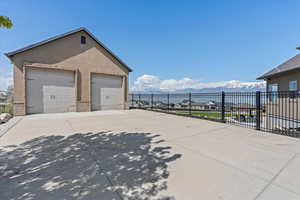 Exterior space featuring a mountain view and fence