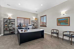 Home office with baseboards, recessed lighting, and carpet