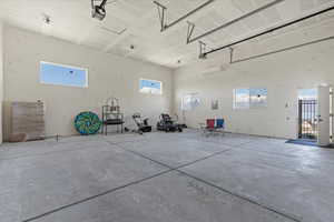 Garage featuring a garage door opener
