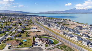Bird's eye view featuring a residential view and a water and mountain view
