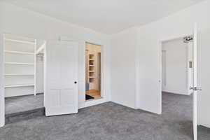 Unfurnished bedroom featuring carpet floors