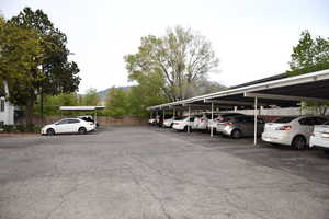 Covered parking lot with fence