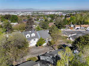 Aerial view featuring a mountain view and a residential view